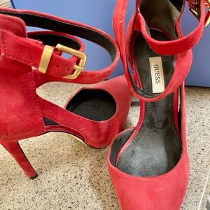 Red suede pumps